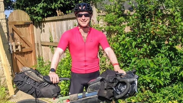 Nicholas Collins with his bike before bikepacking trip