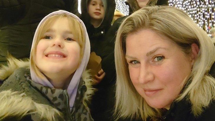 A happy selfie of a woman called Kirstin Crabbe with two of her young children.