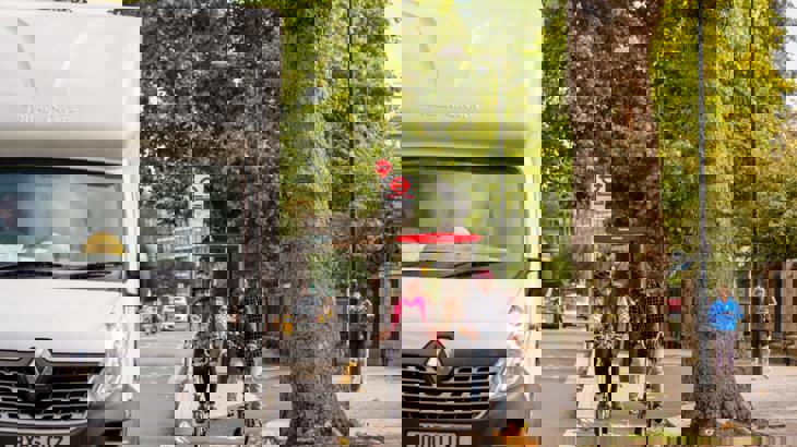 Two cyclists in a protected cycle lane in London