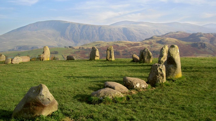A picture showing the atmospheric quality of the Castlerigg Stone Circle in Keswick, with the Lake District's hills clear in the background