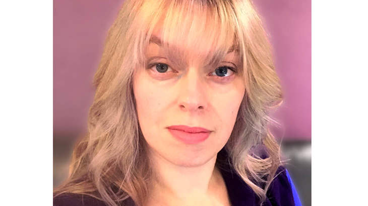 Selfie-style photo of Rachel, close up