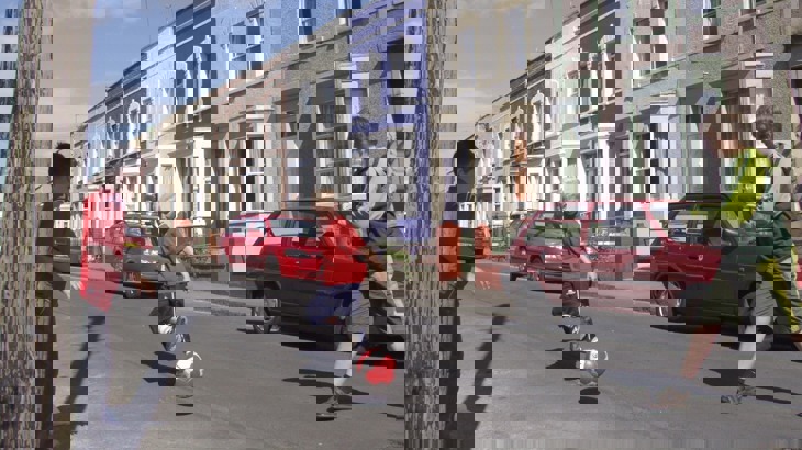 Children playing football in the street