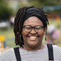 Woman smiling.
