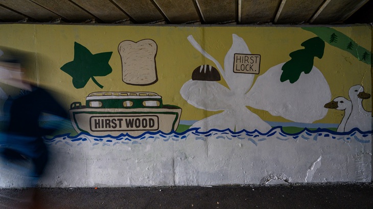 picture of a boat at Hirst Lock, painted on a wall