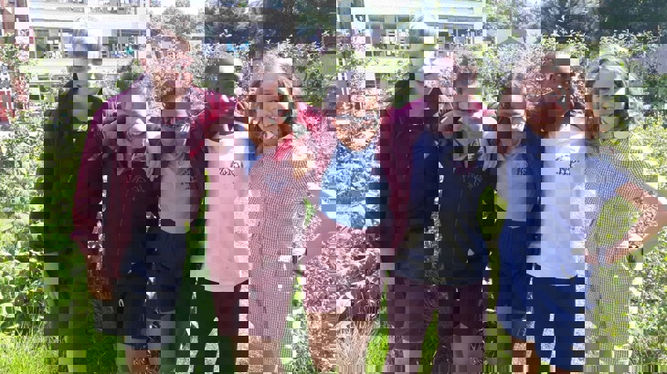 Children From Witherfield School Pose For A Photo