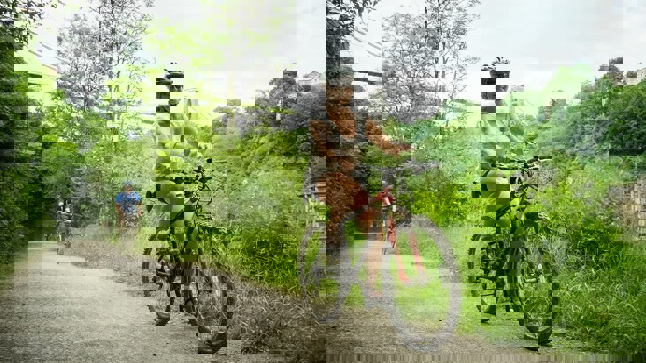 Cyclist under Clifton suspension bridge