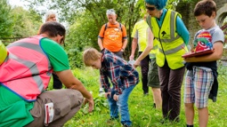 Volunteers and members of the public on a wildlife walk