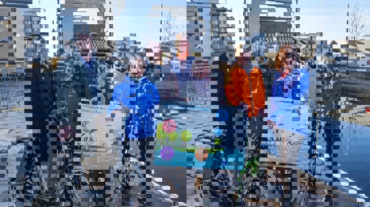 People gathered at Leamington Lift Bridge on National Cycle Network to mark 100,000 journeys