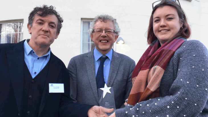 Photo caption: Walk Wheel Cycle Trust Active Travel Officers Tom O’Dowd and Sarah Mawhinney pictured with Belfast Healthy Cities chairman David Stewart who presented them with the award for the Belfast Community Active Travel programme. 