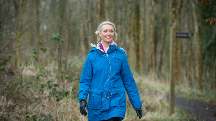 Woman smiling as she walks to work