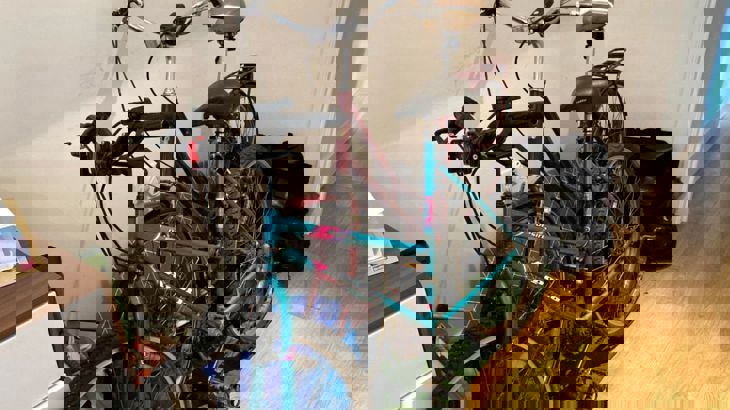 Bike propped up against wall in London flat