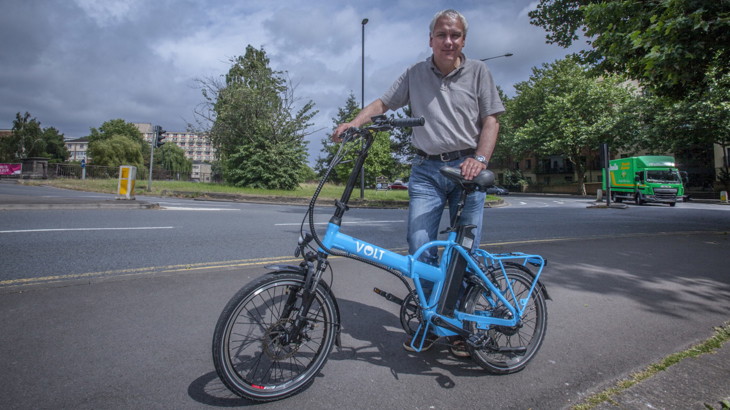 Peter Wise - CEO of Minuteman Press in Bristol - with one of his electric delivery bikes.