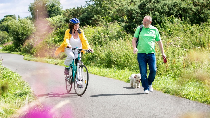Cyclist and walker on Comber Greenway