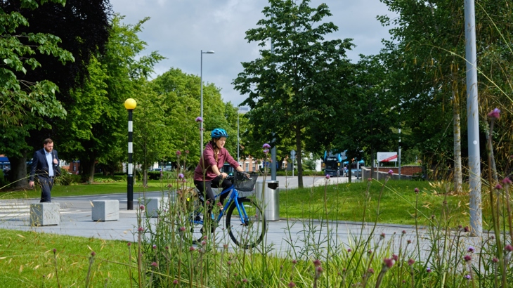 Cyclist and walker on Coventry traffic-free path