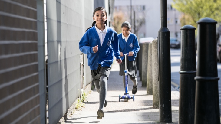Children scooting and walking in Tower Hamlets