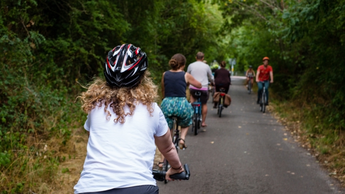 people cycling on the left of a shared path 