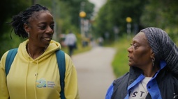 Sophia Brown, leader of the women of colour walking group Steppin Sistas walking along the Bristol and Bath Railway Path with a friend