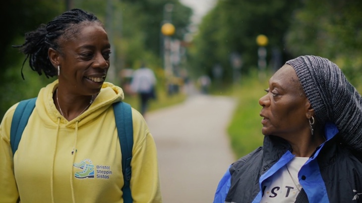 Sophia Brown, leader of the women of colour walking group Steppin Sistas walking along the Bristol and Bath Railway Path with a friend