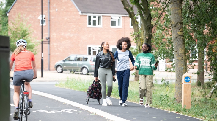 A group of friends enjoy walking along the newly revamped section of National Cycle Network 52 in Coventry. Photo: Mark Radford/Walk Wheel Cycle Trust 